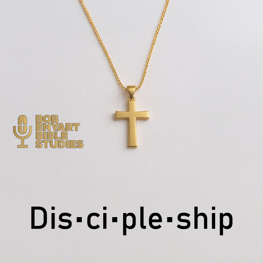 Golden cross pendant necklace with chain, by Bob Enyart Bible Studies, displayed with logo and "Discipleship" text on white background